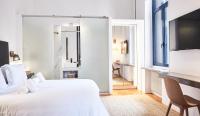 Posteľ alebo postele v izbe v ubytovaní Art Pantheon - Suites & Apartments