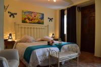 Cama o camas de una habitación en Hostal Rural Molino Del Bombo