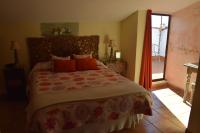 Cama o camas de una habitación en Hostal Rural Molino Del Bombo