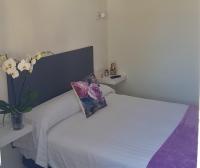Posteľ alebo postele v izbe v ubytovaní Hotel Malecon