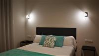 Posteľ alebo postele v izbe v ubytovaní Hotel Malecon