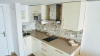 Kuchyňa alebo kuchynka v ubytovaní Beachfront apartment in Fuengirola with sea views