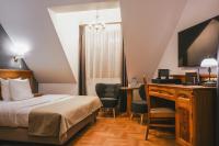 Posteľ alebo postele v izbe v ubytovaní Hotel & Apartments Ventus Rosa