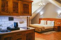Kuchyňa alebo kuchynka v ubytovaní Hotel & Apartments Ventus Rosa