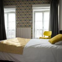 Un ou plusieurs lits dans un h&eacute;bergement de l&#39;&eacute;tablissement Hotel de Paris