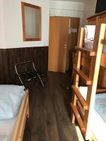 Postel nebo postele na pokoji v ubytování Hotel Guntia Boardinghouse