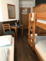 Postel nebo postele na pokoji v ubytování Hotel Guntia Boardinghouse