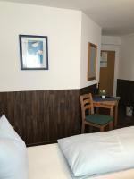 Postel nebo postele na pokoji v ubytování Hotel Guntia Boardinghouse
