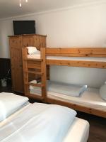 Postel nebo postele na pokoji v ubytování Hotel Guntia Boardinghouse
