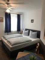 Postel nebo postele na pokoji v ubytování Hotel Guntia Boardinghouse