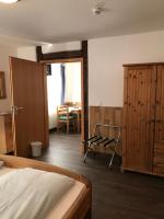 Postel nebo postele na pokoji v ubytování Hotel Guntia Boardinghouse