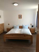 Postel nebo postele na pokoji v ubytování Hotel Guntia Boardinghouse