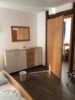 Postel nebo postele na pokoji v ubytování Hotel Guntia Boardinghouse