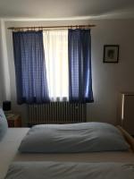 Postel nebo postele na pokoji v ubytování Hotel Guntia Boardinghouse