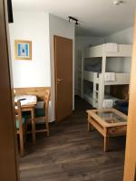 Postel nebo postele na pokoji v ubytování Hotel Guntia Boardinghouse