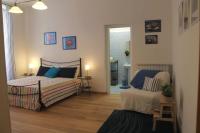 Posteľ alebo postele v izbe v ubytovaní Home 103