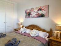 A bed or beds in a room at Clubrent - Apartamentos Apolo 16