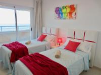 A bed or beds in a room at Clubrent - Apartamentos Apolo 16