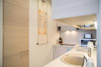 Asian Magnolia Boutique Apartmentsにあるキッチンまたは簡易キッチン