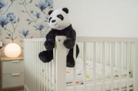 Asian Magnolia Boutique Apartmentsにあるベッド