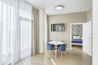 Asian Magnolia Boutique Apartmentsにあるテレビまたはエンターテインメントセンター