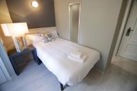 Postel nebo postele na pokoji v ubytování Hotel Alda Estación Vigo