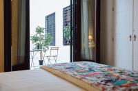 A bed or beds in a room at New Amor de Dios