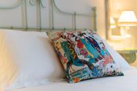 A bed or beds in a room at New Amor de Dios