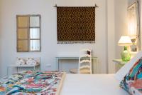 A bed or beds in a room at New Amor de Dios
