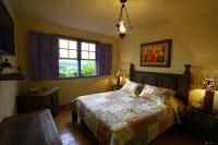 A Casa Vermelha Hospedariaにあるベッド