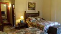 A Casa Vermelha Hospedariaにあるベッド