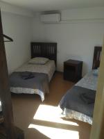 Łóżko lub łóżka w pokoju w obiekcie Casa del Pintor