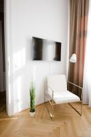 TV a/nebo společenská místnost v ubytování Studio Apartments Urania - Mai's Apartments