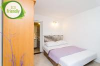 Posteľ alebo postele v izbe v ubytovaní Plavac Mali Suites