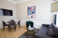 TV a/nebo společenská místnost v ubytování Studio Apartments Urania - Mai's Apartments