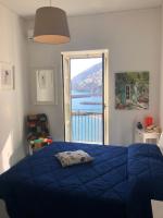 Posteľ alebo postele v izbe v ubytovaní Casa La Voce del Mare