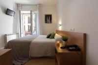 Postel nebo postele na pokoji v ubytování Hostal La Numantina