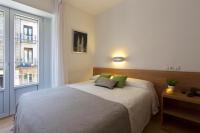 Postel nebo postele na pokoji v ubytování Hostal La Numantina