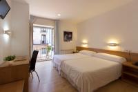 Postel nebo postele na pokoji v ubytování Hostal La Numantina
