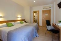 Postel nebo postele na pokoji v ubytování Hostal La Numantina