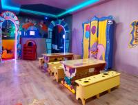 a room with a table and some play equipment at Herods Palace Hotels & Spa Eilat a Premium collection by Fattal Hotels in Eilat