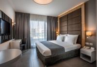 Ein Bett oder Betten in einem Zimmer der Unterkunft Hotel Astral Nirvana Club- Half Board