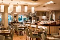 Ein Restaurant oder anderes Speiselokal in der Unterkunft Hotel Astral Nirvana Club- Half Board 