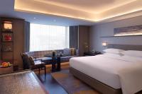 Grand Hyatt Hangzhouにあるベッド