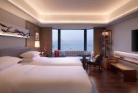 Grand Hyatt Hangzhouにあるベッド