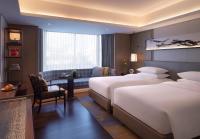 Grand Hyatt Hangzhouにあるベッド