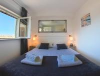 Posteľ alebo postele v izbe v ubytovaní S & V Deluxe Apartments