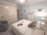 A bed or beds in a room at VILLA OLIVEIRA by Buenavilla