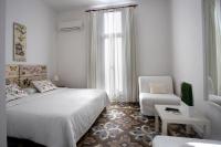 Postel nebo postele na pokoji v ubytování Hostal Eixample