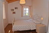 Postel nebo postele na pokoji v ubytování Villa Petra